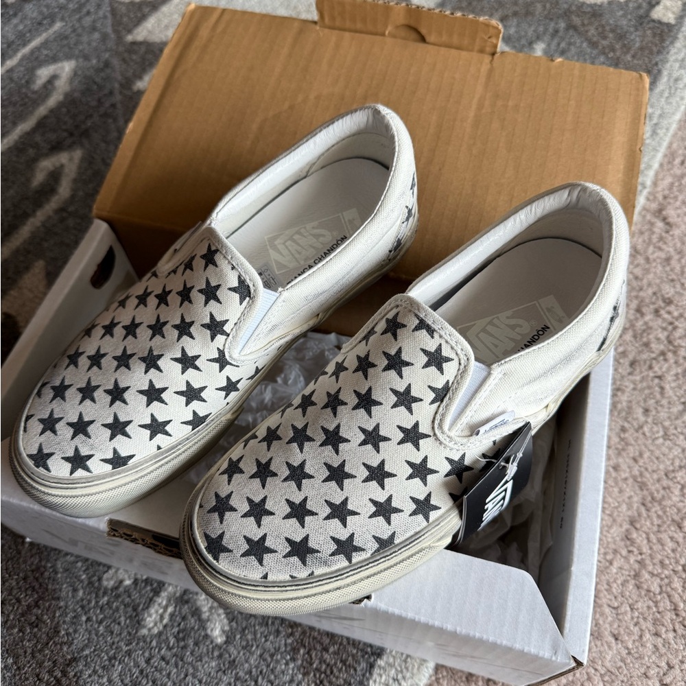 Vans x Bianca Chandon  white/ Black Star Slip-On Sneakers
NWT M 6 W 7.5